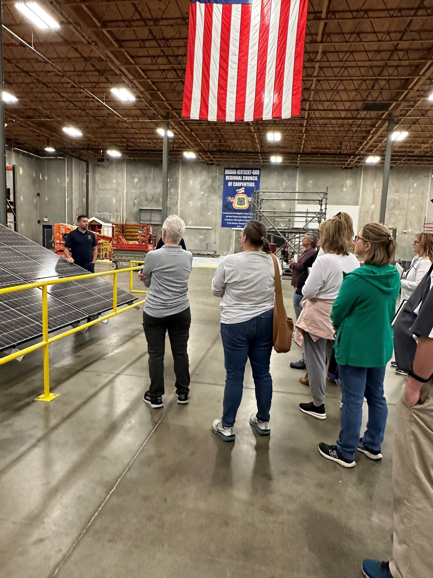 Educators learning about solar panels and local businesses as part of Teacher CAMP.